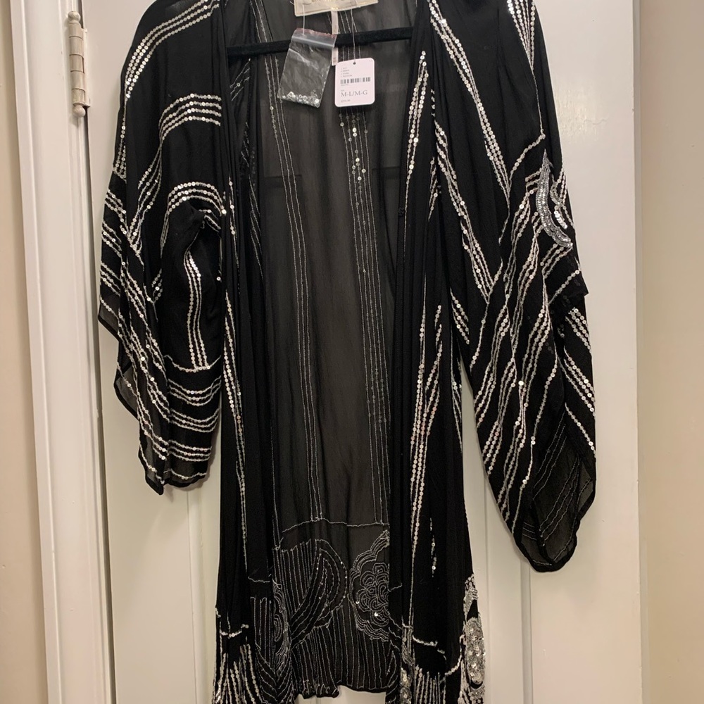 Jens pirate booty sold by free people. Black with sequin detail
